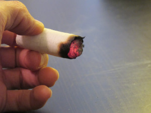 Cupping and moxibustion, image of rolled moxa used for indirect moxibustion