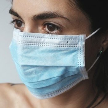 woman wearing surgical mask