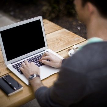 man working at laptop